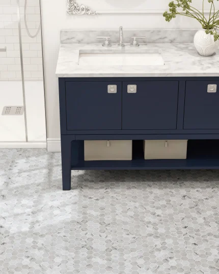Bianco Carrara polished hexagon marble mosaic tile installed in a bathroom floor