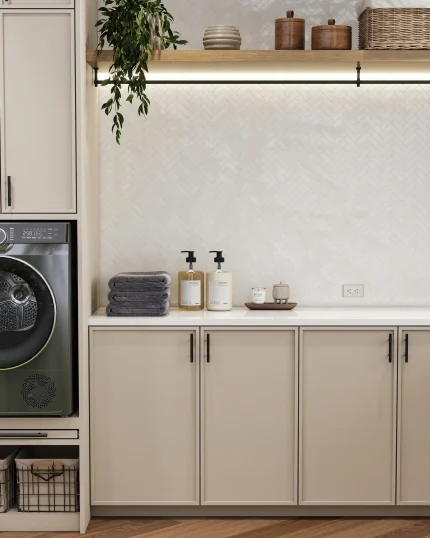Dolomite polished herringbone marble mosaic tile installed as a laundry room backsplash