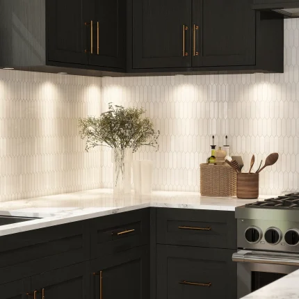 Close-up of Bianco Dolomite polished picket marble mosaic on a kitchen backsplash