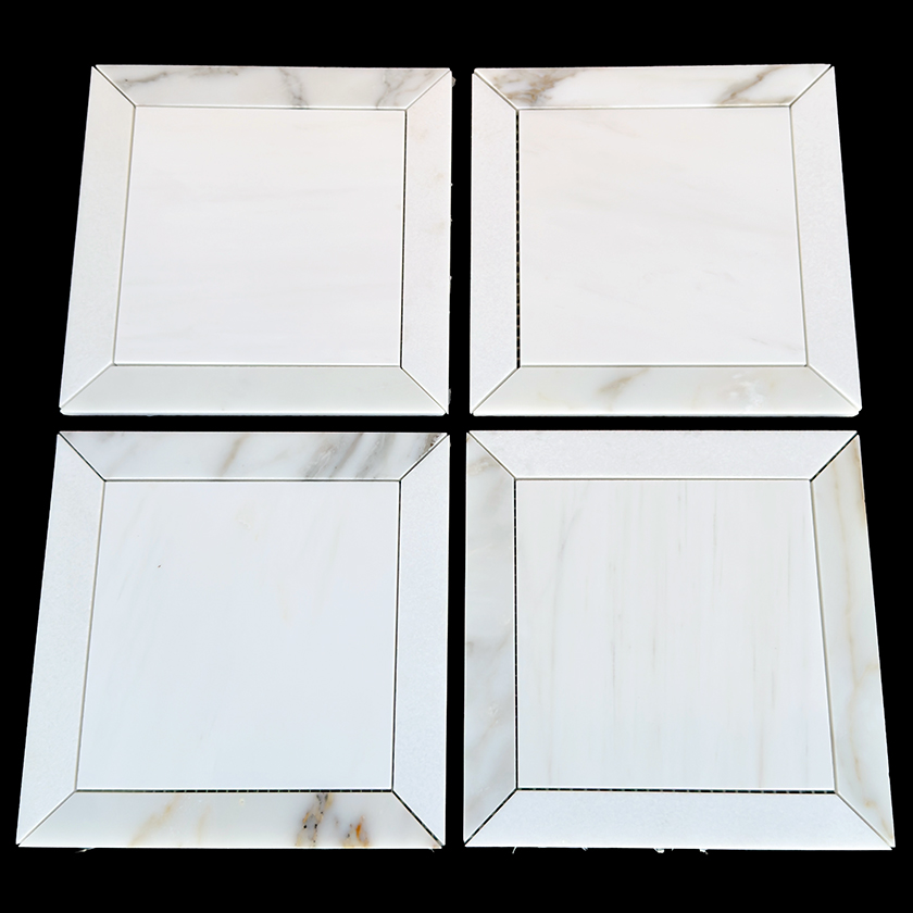Casa Grande thassos and calacatta gold natural stone mosaic lot image showing natural variation | The Mosaic Shop