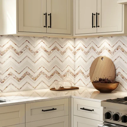 Close-up of Infinity Chevron mosaic showing Thassos marble jade strips and warm mother of pearl band detail