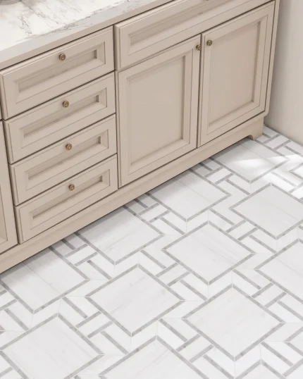 Close-up of Myrtle Carrara waterjet marble mosaic on a bathroom floor