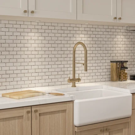 Close-up of New York Brick marble and mother of pearl mosaic on a kitchen backsplash