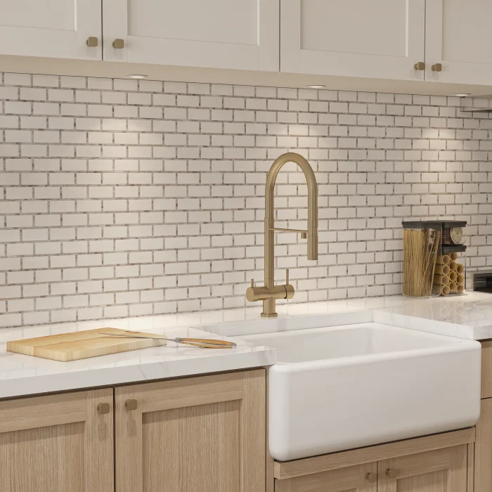 Close-up of New York Brick marble and mother of pearl mosaic on a kitchen backsplash