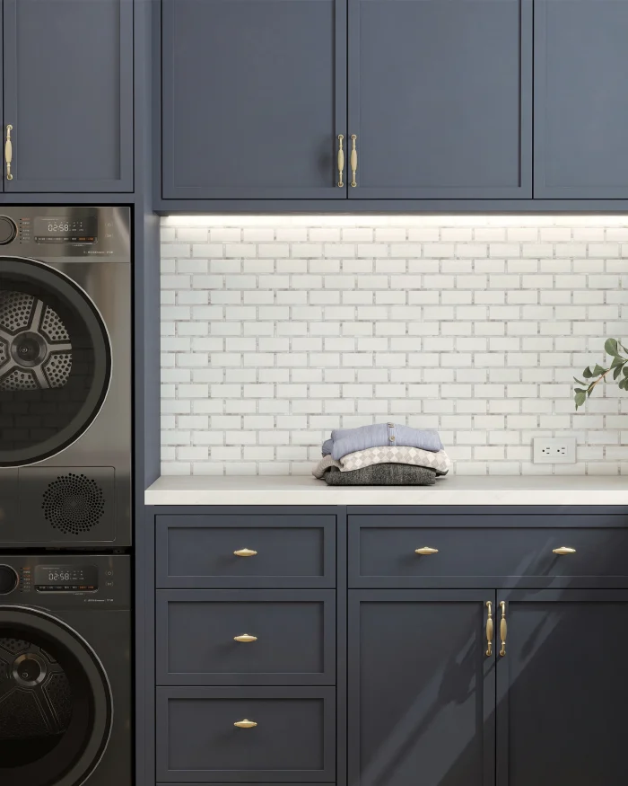 New York Brick White marble and mother of pearl mosaic tile installed as a laundry room backsplash