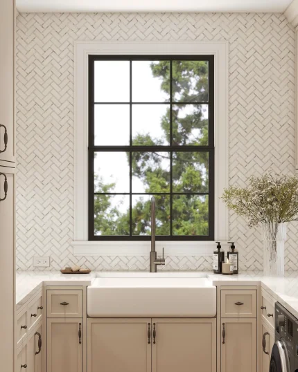 Paradise Warm herringbone marble and mother of pearl mosaic tile installed as a laundry room backsplash