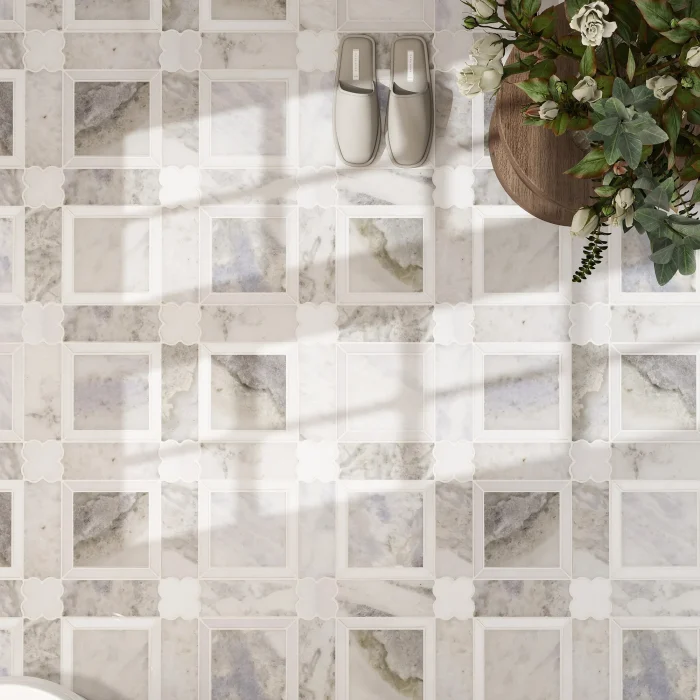 Close-up of Portofino marble mosaic showing Azul Cielo field pieces and Thassos quatrefoil border detail