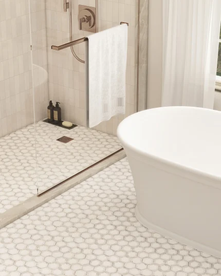 Savannah Hex marble mosaic tile installed on a shower floor