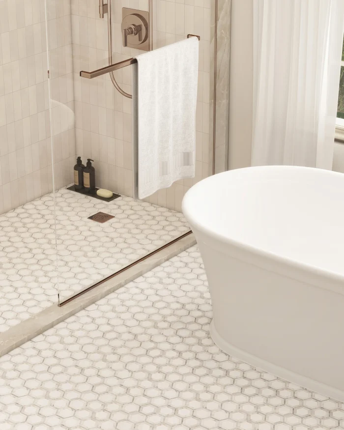 Savannah Hex marble mosaic tile installed on a shower floor