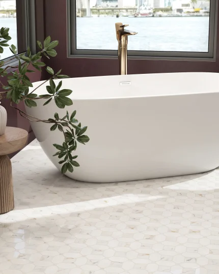 Seabreeze Calacatta marble mosaic tile installed on a bathtub surround