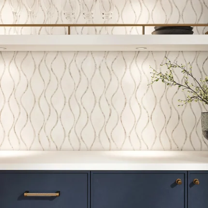 Close-up of Seaside White mosaic showing Thassos marble field and sinuous white mother of pearl strand detail