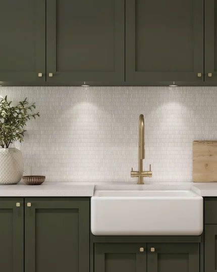 Studio Bianco mixed finish honed polished and leathered broken joint mini brick marble mosaic tile installed as a kitchen backsplash