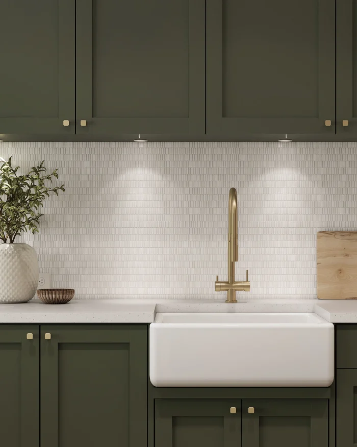 Studio Bianco mixed finish honed polished and leathered broken joint mini brick marble mosaic tile installed as a kitchen backsplash