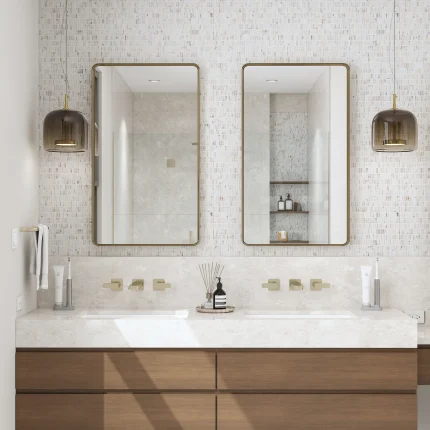 Studio Calacatta Gold mixed finish honed polished and leathered broken joint mini brick marble mosaic tile installed on a bathroom vanity wall