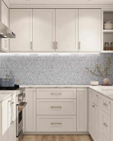 Studio Carrara mixed finish honed polished leathered broken joint mini brick marble mosaic tile installed as a kitchen backsplash