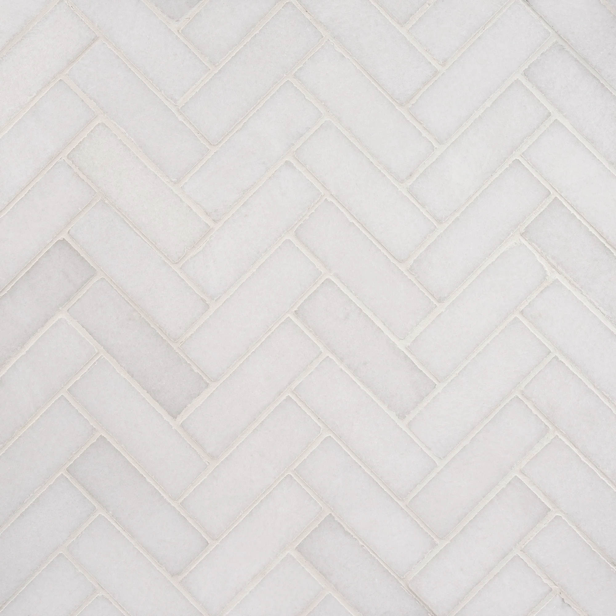 Thassos 1x3 polished herringbone marble mosaic tile | The Mosaic Shop